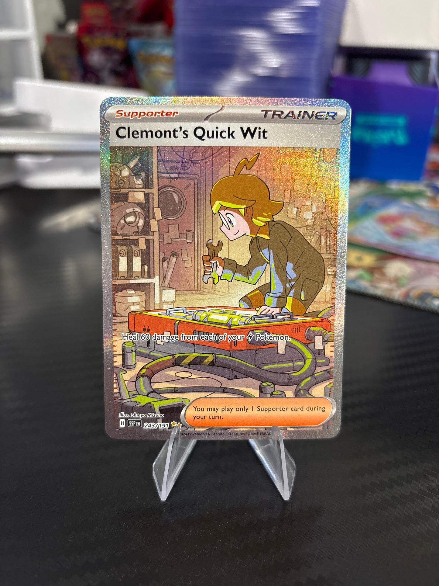 Clemont’s Quick Wit #243 - Special Illustration Rare - Surging Sparks